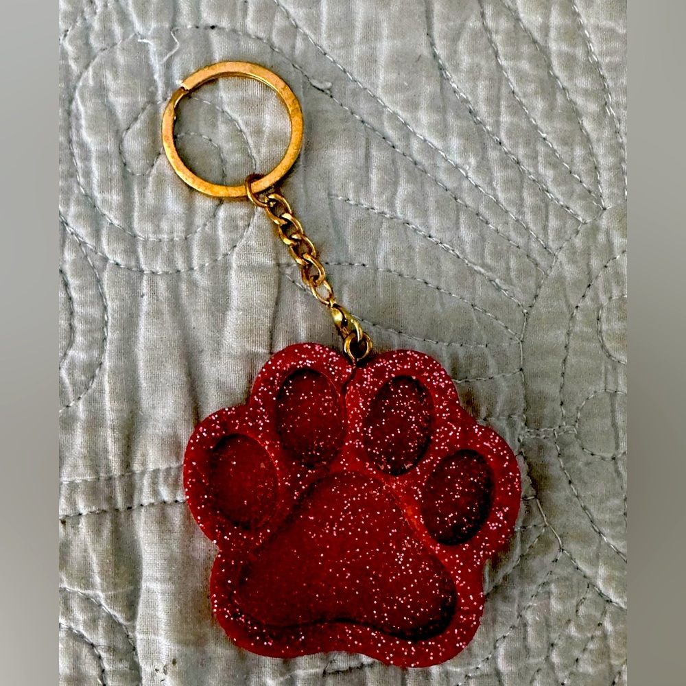 Really cute paw keychain.